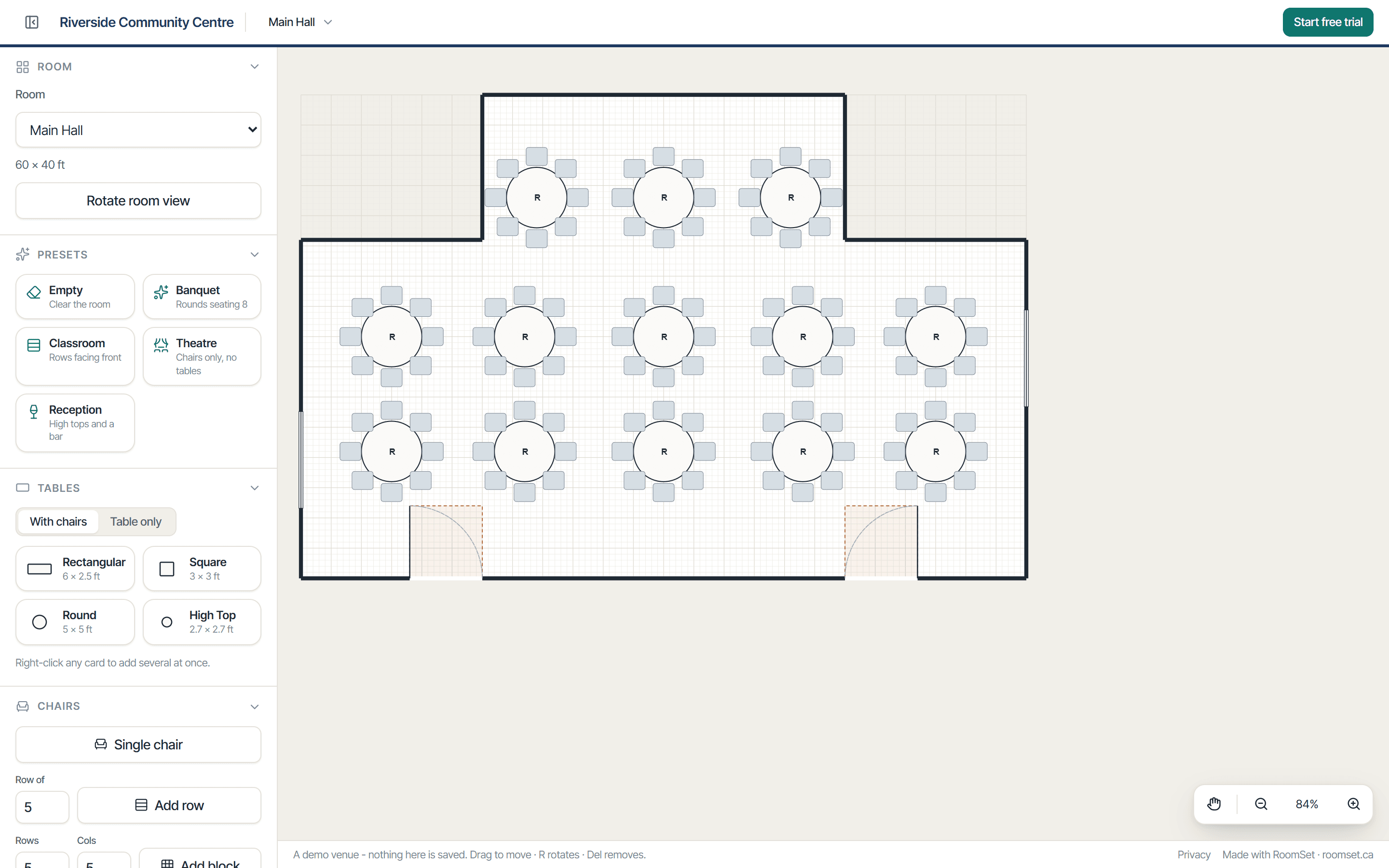 A hall with a stage recess laid out for a banquet: thirteen rounds of eight, two doors with their swings kept clear, and the furniture library in the sidebar.